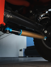 Owl Grenadier Steering Stabilizer installed on vehicle suspension for improved street and off-road driving stability