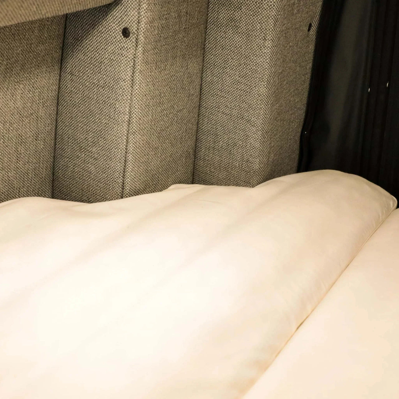 Ultra Luxe Dream Sheets on a Winnebago Revel bed with cozy, custom-fitted microfiber bedding