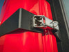 20L Jerry Can holder mount on red INEOS Grenadier vehicle door hinge