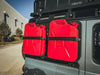 20L Jerry can holder mounted on vehicle with two red jerry cans secured by black straps