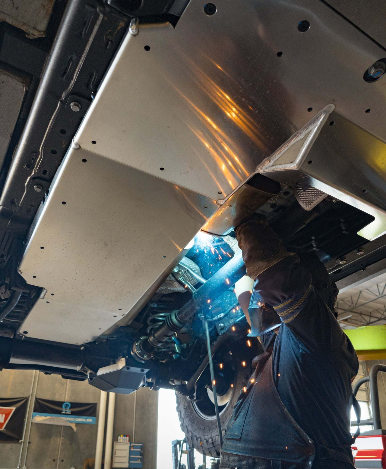 Grenadier skid plate installed under vehicle for drivetrain protection during offroad driving