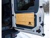 Folding tailgate table mounted on INEOS Grenadier rear door for outdoor and overland use
