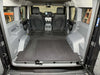 Explore Series Second Row Seat Delete Plate System installed creating flat cargo space with access hatches