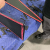 INEOS Grenadier Fender Armor Plates laid out on protective blue blanket showing adhesive backing.