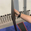 Hand holding Grenadier Fender Armor Plate showing slim durable design for vehicle protection
