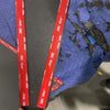 Grenadier Fender Armor Plates with 3M adhesive strips on a textured blue surface, designed for durable vehicle upgrade.