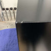 Black large classic cargo box with a textured aluminum surface and visible corner welds on a blue protective mat.
