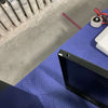 Large Classic Cargo Box open black aluminum storage container on blue padded surface