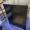 Large Classic Cargo Box in black aluminum with secure locking latch for gear storage and transport