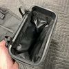 Black Seatback Small Trash Bag made of durable, water-resistant material with roll-top closure for road trips and van organization