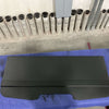Black powder-coated Sprinter headliner shelf for 2019+ Sprinter vans, designed for extra storage above driver and passenger seats.