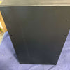 black van storage box with mounting holes placed on quilted surface