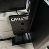 Close-up view of the Revel Console Table mounting bracket installed in a van interior with Canyon Adventure Vans logo visible.