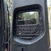 Insulated black Sprinter rear window cover with zippered access for airflow and privacy, designed for temperature control and easy installation.