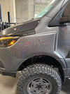 Sprinter van front wheel with rugged Sprinter Trail Fender Flares and off-road tire