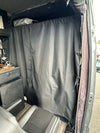 Stealth Blackout Curtain installed inside a van blocking light and providing privacy for urban camping
