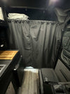Stealth Blackout Curtain inside van for privacy and heat blockage during urban camping