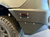 Ridgeline PreRunner full bumper and skid plates installed on Sprinter vehicle front side close-up