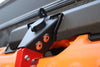 RBQM Maxtrax Mount locking quick release attached to vehicle holding orange recovery board
