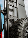Close up of Owl ladder tire carrier on the rear doors of a Mercedes Sprinter van