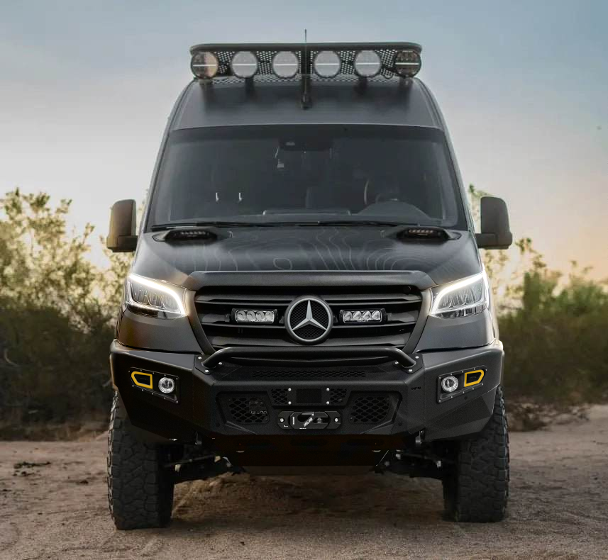 Ridgeline Sprinter bumper with integrated lighting on black Mercedes van in outdoor setting