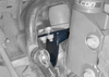 Rally Strut Bump Stop Support Bracket installed on AWD van suspension with bolts and reinforced metal bracket.
