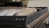Black powder-coated Ekko Roof Rack Teton Edition mounted on a rugged vehicle roof, designed for Winnebago Ekko and Pop-Top models.