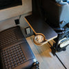 Revel Console Table carbon black folding table with built-in cup holder installed in van front cabin between seats