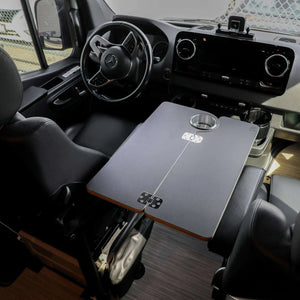 Revel Console Table carbon black folding table installed in van front cabin with cup holder and workspace surface