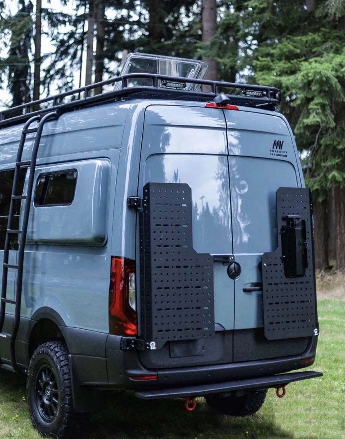 Sherpa Cargo Carrier mounted on rear door of 2007-2018 Sprinter van in forest setting