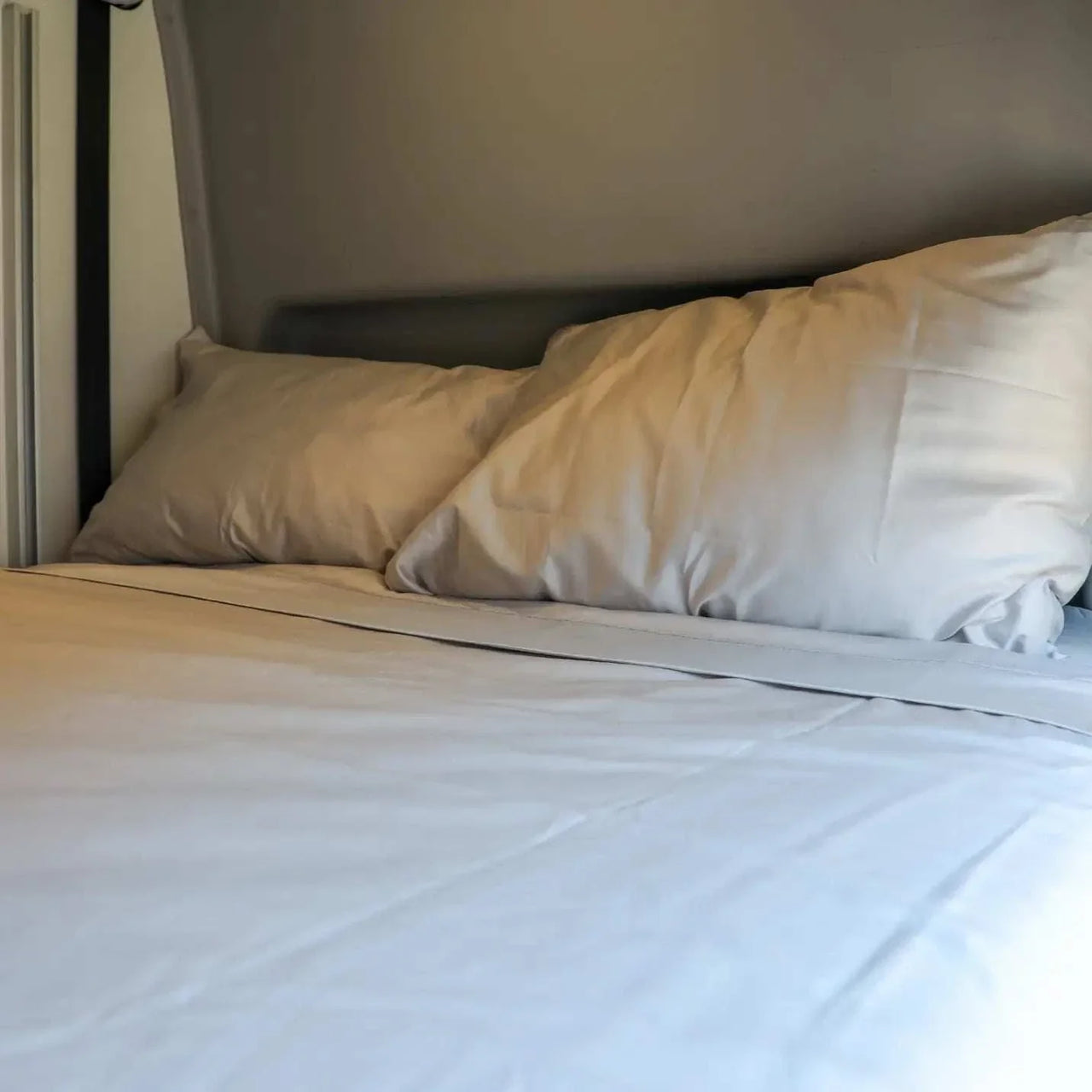 Ultra Luxe Dream Sheets microfiber bedding set fitted on Winnebago Revel bed with pillows