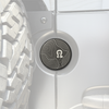 Machined aluminum rear door emblem with laser engraving on Sprinter van, designed for oversized tire clearance and factory mounting.