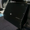Black lockable Seat Back Locker installed behind Sprinter front seat for secure storage