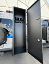 Black open van storage box with interior ski and snowboard racks mounted on vehicle side