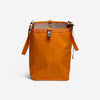 RUX 25L Bag in orange, versatile and easy to pack, designed to nest inside the RUX 70L bag for organized storage.