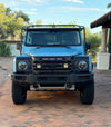 LP4 Grille Light Mounts for INEOS Grenadier with Baja Designs LP4 lights.
