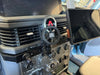 Carbon Fiber/Kevlar Mount Arm installed in vehicle for secure device stability.