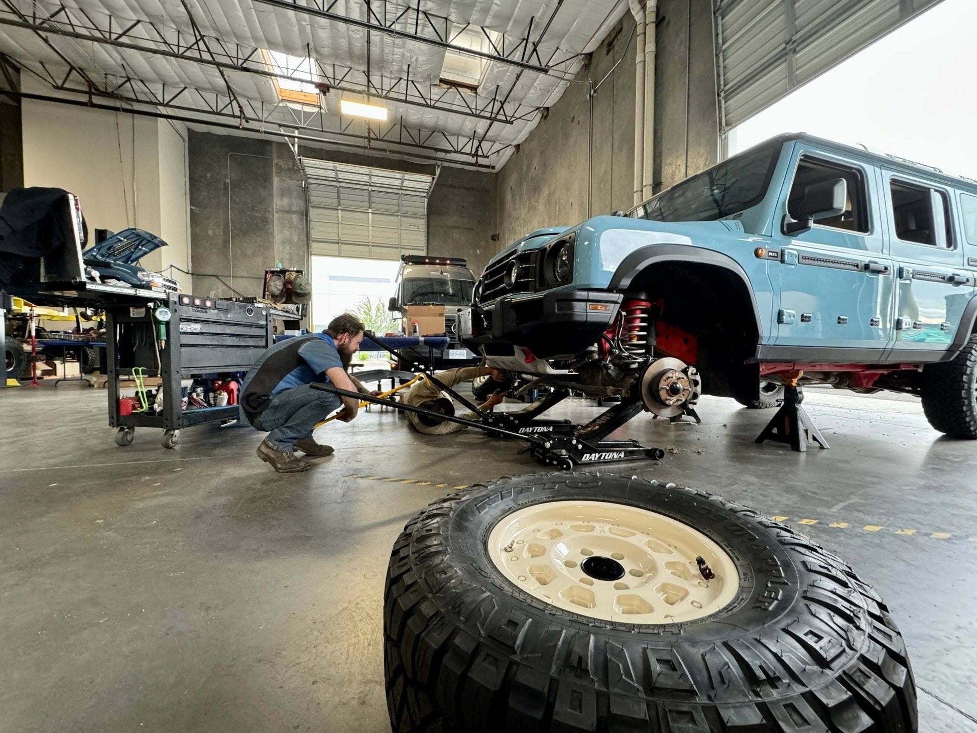 Pro Lift Kit 2.5" installation on INEOS Grenadier in a garage setting.