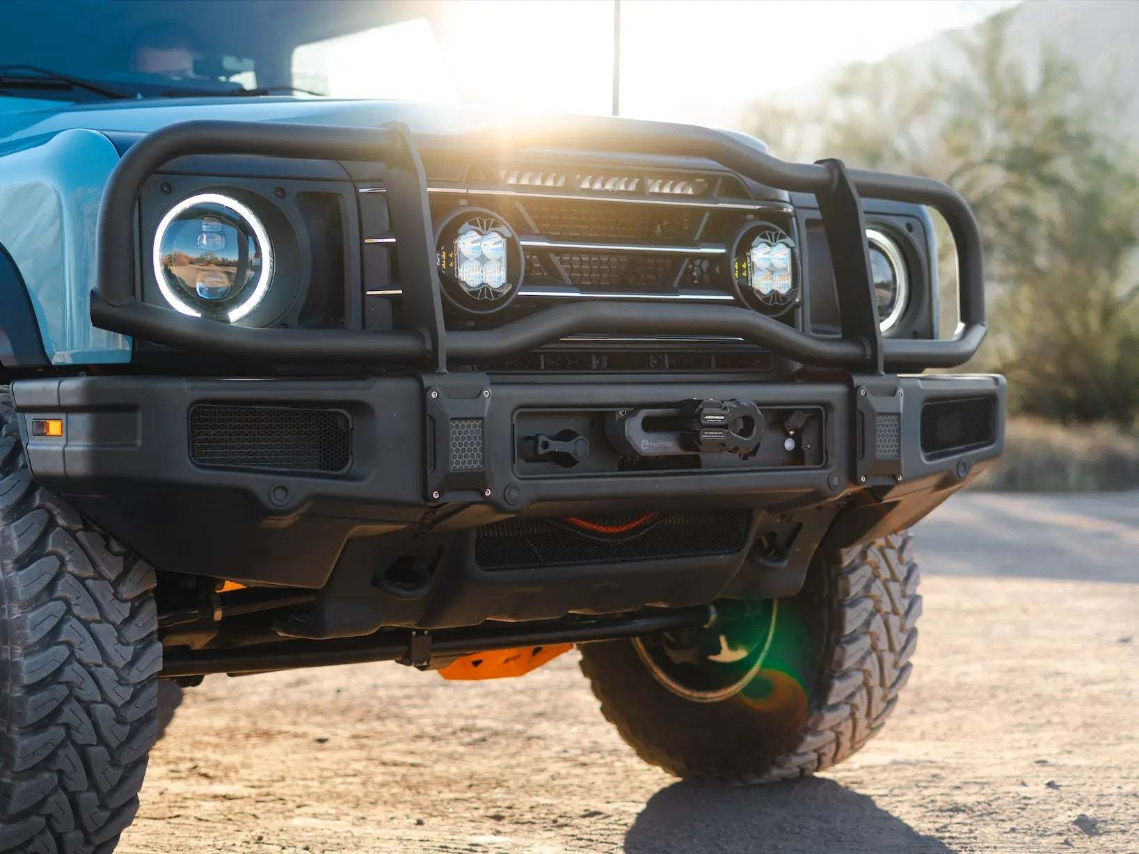 Hidden 12.5K Winch Kit installed on INEOS Grenadier, showcasing durability and seamless integration for rugged adventures.