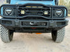 Hidden 12.5K Winch Kit installed on INEOS Grenadier for off-road durability.
