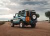 INEOS Grenadier off-road vehicle with high clearance steel rear bumper in desert setting