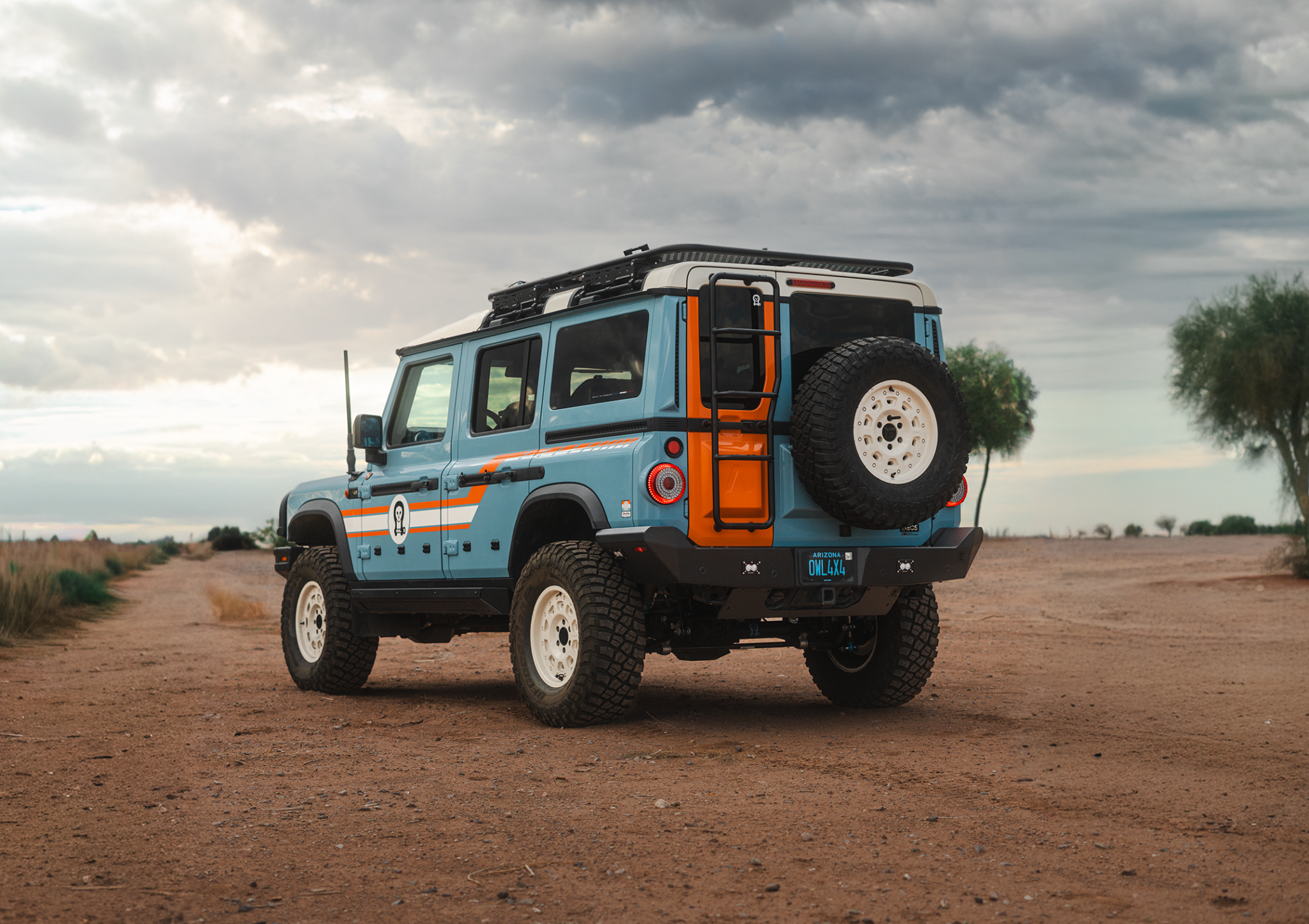INEOS Grenadier off-road vehicle with high clearance steel rear bumper in desert setting