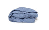 Blue down comforter designed for durability and adventure use.