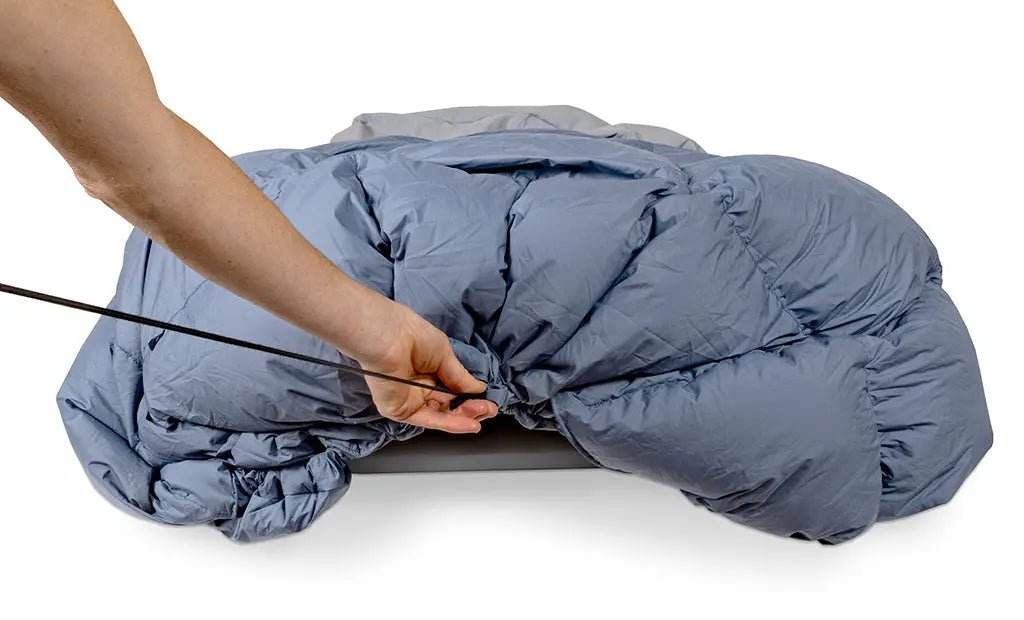 Down comforter in use for durability and utility in adventurous settings.