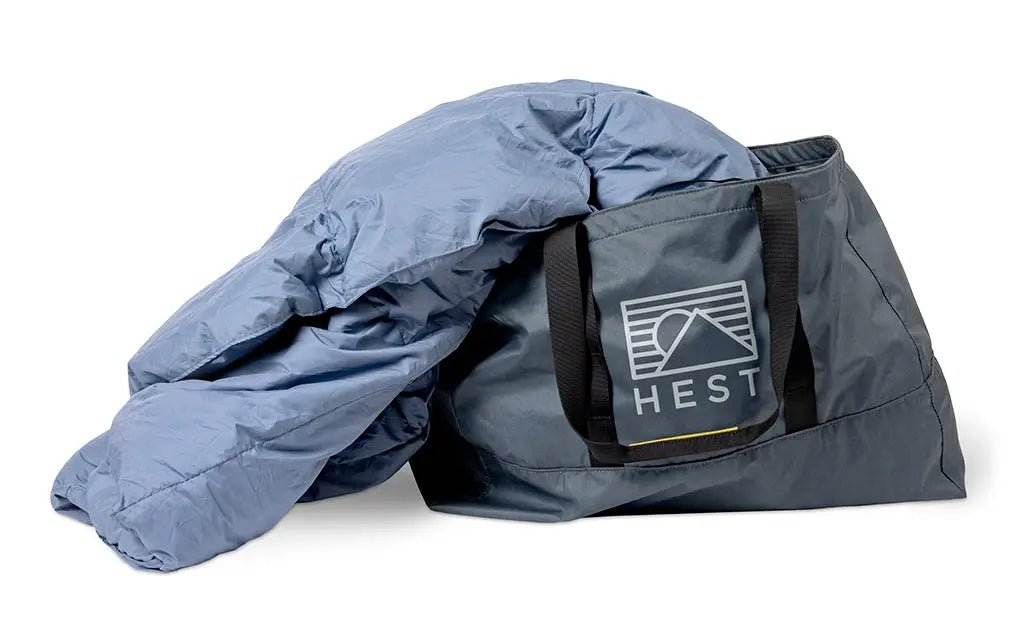 Down Comforters by HEST in a bag designed for adventure and durability.