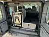 Grenadier Explore Series rear plate system with CampKitchen and single drawer module installed in vehicle cargo area