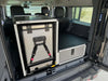 Grenadier Explore Series rear plate system and CampKitchen 2.2 with single drawer module installed in vehicle cargo area for organized storage and camping gear.