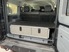 Explore Series Side X Side Drawer Module with fitted top plate installed in vehicle cargo area