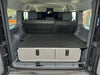 Side X Side Drawer module with fitted top plate installed in vehicle cargo area