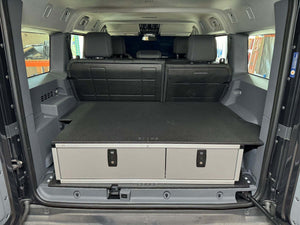 Side X Side Drawer module with fitted top plate installed in vehicle cargo area
